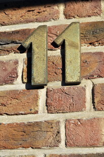The number 11 on a wall
