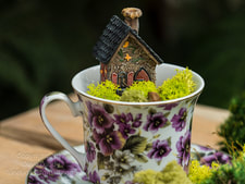 fairy house in a tea pot