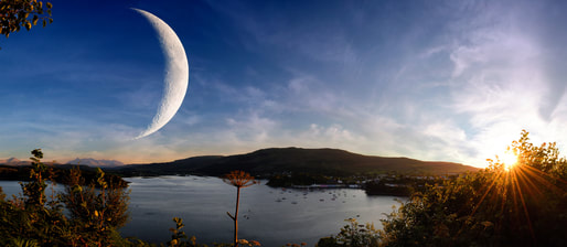 waning crescent moon in beautiful vista