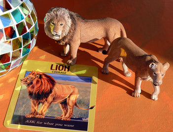 lion symbols, signs, oracle card spiritual meaning