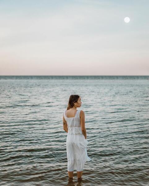 woman with beach at twilight, moon energy