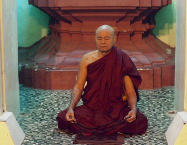 monk spiritual teacher meditating