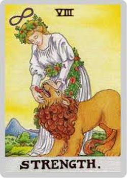 lion spiritual meaning Strength tarot card