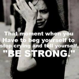 emotional woman in black and white with 'be strong' quote
