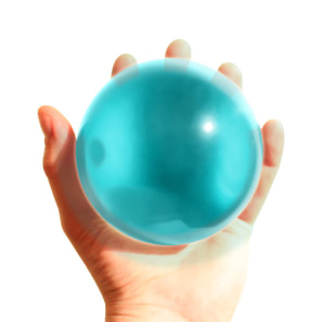 hand holding crystal ball