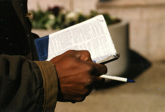 hands holding bible
