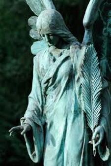 angel statue with angel feather