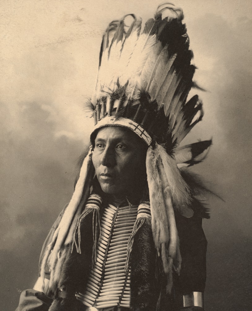 PictureNative American Chief wearing a feather headpiece