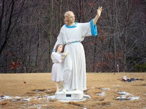 ascended master and child statue