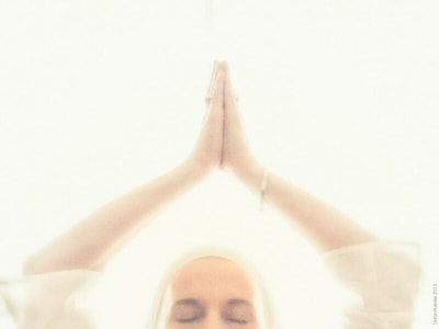 praying woman white light
