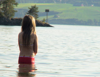 woman in lake, relaxed spiritual energy feeling 