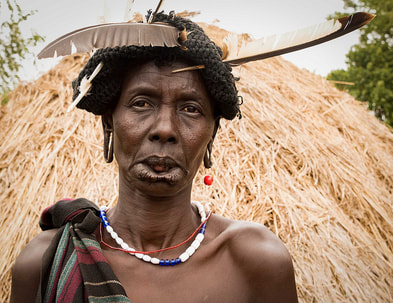 tribal woman with feather in head
