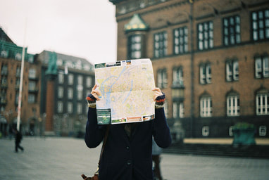 person looking at map