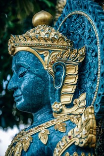 blue and gold buddha statue