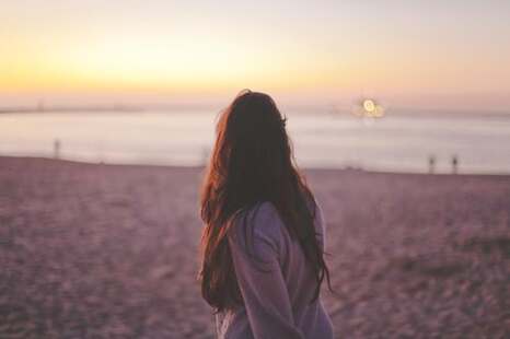 soul woman on beach sunset