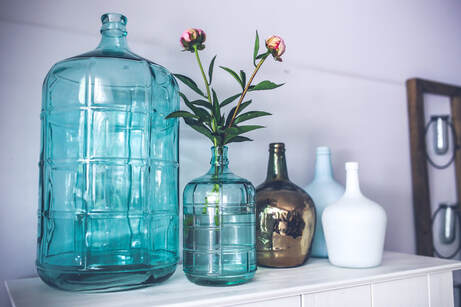 pretty blue vases on display